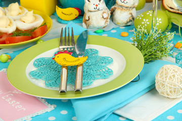 Serving Easter table with tasty dishes close-up