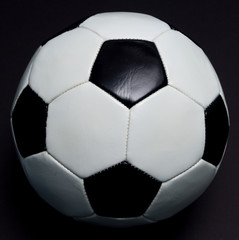 Soccer ball on black
