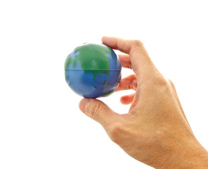 hand holding a global model toy
