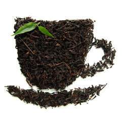 Dry black tea with green leaves, isolated on white