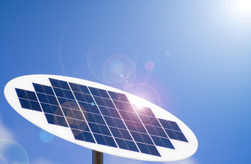 A photovoltaic Solar Panel with blue sky in the background.