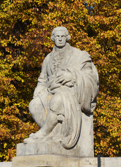 Statue in the park Lazienki - Warsaw Poland - obrazy, fototapety, plakaty
