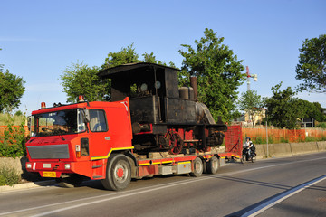 Steam train on a trailer