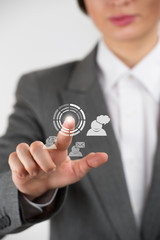 Business woman pointing her fingers on virtual web interface ico
