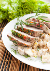 pieces of pork and mushrooms in cream sauce