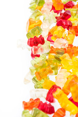 Naklejka na ściany i meble Heap of Gummi Bears isolated on white