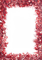 Red Christmas tinsel forming a rectangular on white background