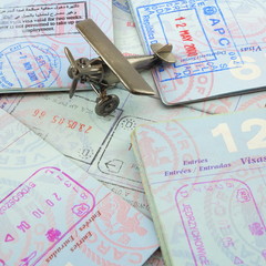 Passports and toy airplane