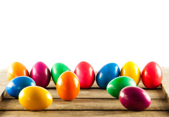 Colorful easter eggs on old wooden background.  Easter concept.