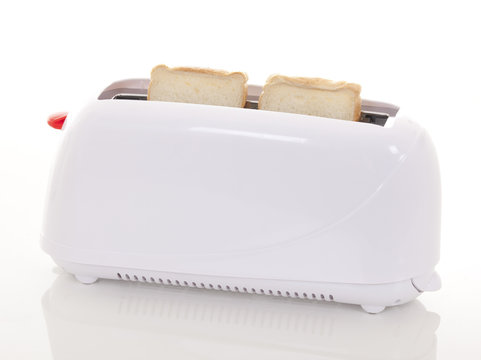  toaster and two hot toasts ready to serve for the breakfast.