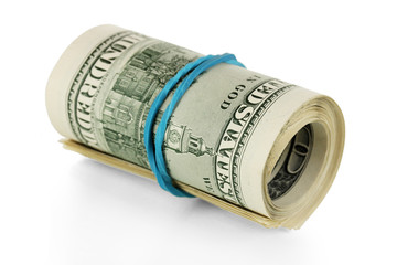 Twisted bundle 100 dollar bills isolated on white