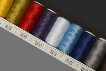spools of thread of different colours