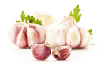 Fresh garlic with parsley isolated on white