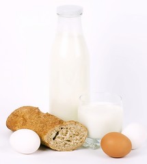 Baking cake and milk on white background