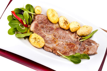 Grilled steak and new potatoes