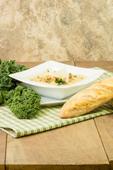 Hearty soup with kale and bread