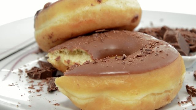 Chocolate Dounuts turning around (loopable HD video)