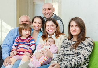 Obraz premium Portrait of cheerful three generations family