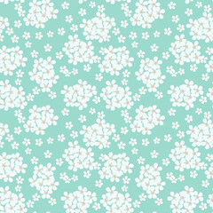 Turquoise background with delicate little flowers