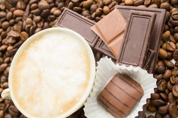 chocolate on coffee beans background