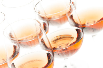 wine glasses with rose wine