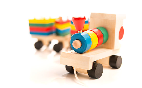 wooden educational toys. colorful train isolated