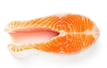 Raw fresh salmon steak isolated on white