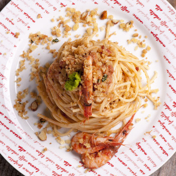 spaghetti with pesto and shrimp with toasted breadcrumbs