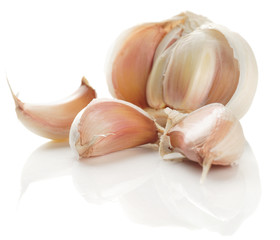 Garlic cloves isolated on white background