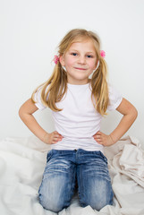 A portrait of a fashion smiling young girl
