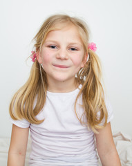 A portrait of a fashion smiling young girl