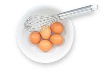 fresh eggs with whisk, isolated on white