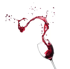 Wall murals Wine Red wine splashing from glass, isolated on white background