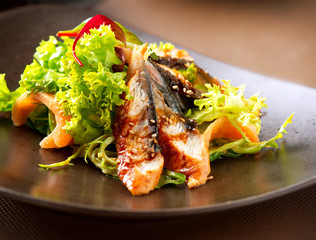 Salad With Smoked Eel with Unagi Sauce. Japanese Food