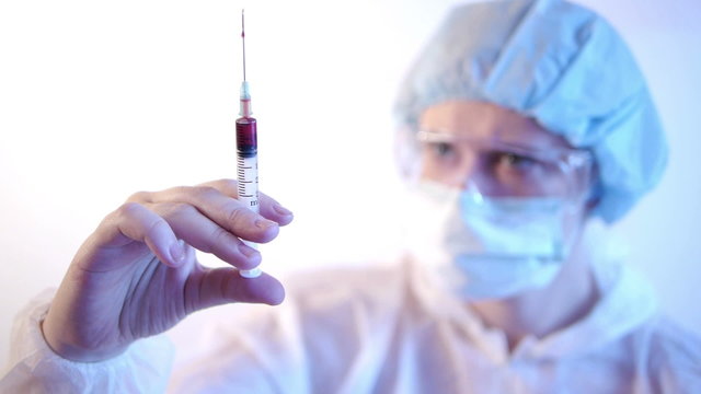 HD - Laboratory. the red drug in the syringe