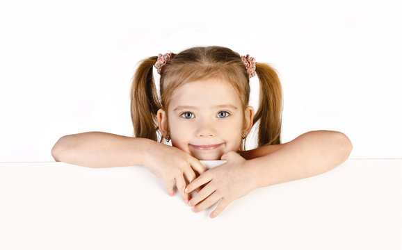 Smiling cute little girl isolated