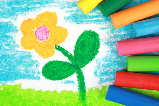 Kinderbild einer Blume auf einer Wiese