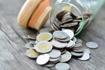 pile of money on wood background