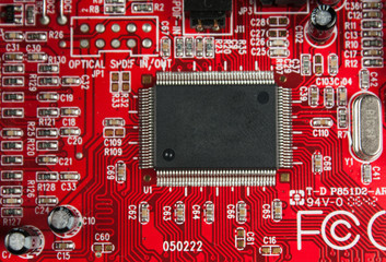 Red Electronic Circuit Board Chip Detail