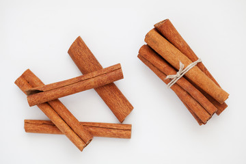 Cinnamon sticks on a white background