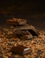 Broken dark chocolate and sprinkles.