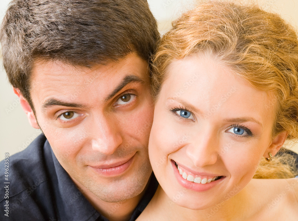 Canvas Prints cheerful smiling young couple, indoors