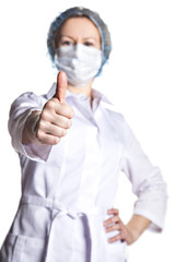 Woman doctor holding a thumb up
