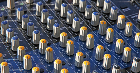 Fototapeta premium potentiometers trimmers and a mixer during a concert