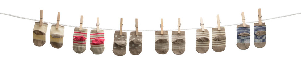Baby socks hanging on clothesline