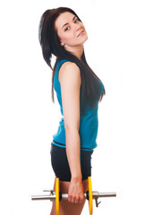 Happy Young woman do sport exercises.