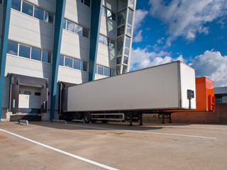 Distribution Center Loading Docks with Cargo Trailers