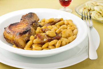 Grilled pork fillet steak with beans