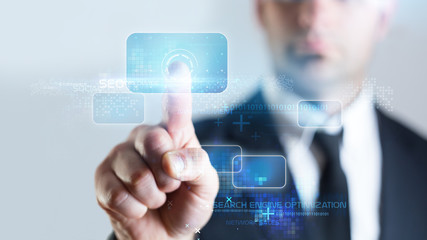 Businessman pressing virtual media on internet technology