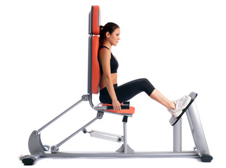 Fototapeta premium Slim brunette on modern isodynamic trainer